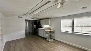 a room with window and air conditioner duct