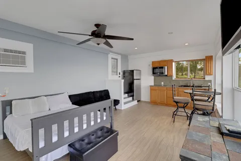 a view of front of house with a yard