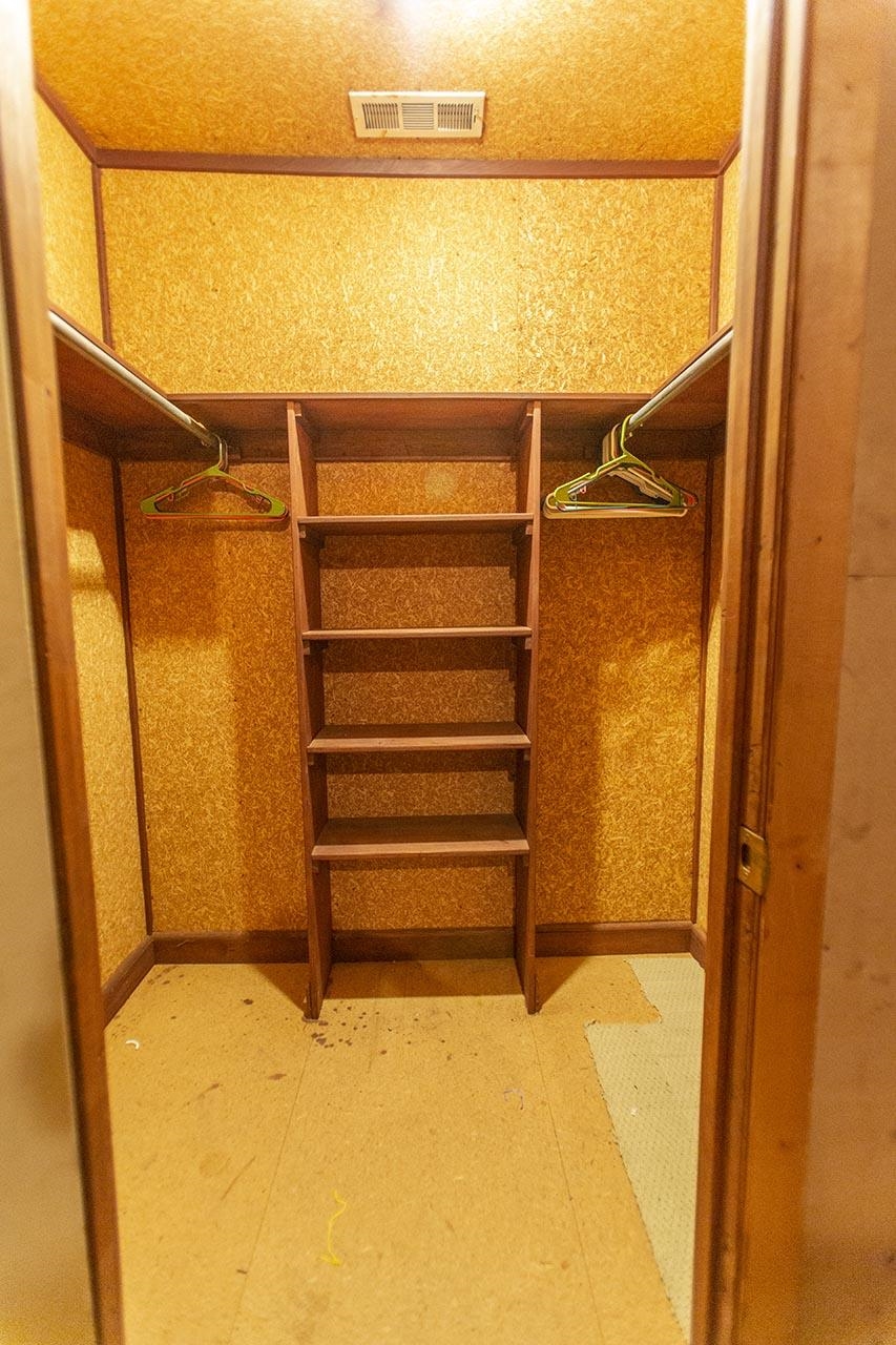 124 South Walnut Bend Road Memphis, TN 38018 - Photo 22 of 22 a view of walk in closet with empty racks