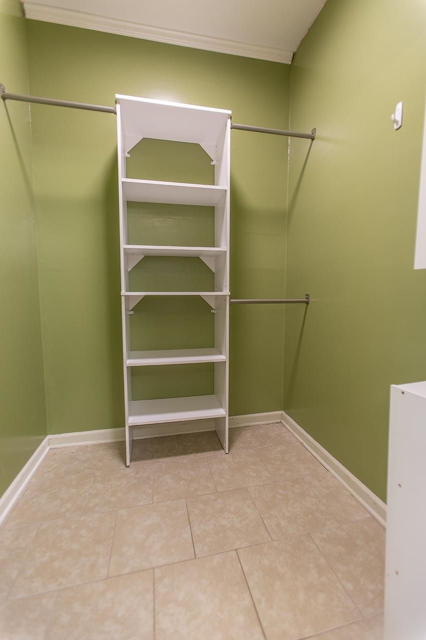 124 South Walnut Bend Road Memphis, TN 38018 - Photo 10 of 22 a view of walk in closet with empty racks