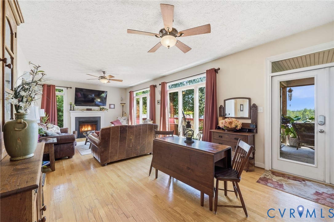 210 Riverview Road Stevensville, VA 23161 - Photo 25 of 63 Bright living area featuring wood-finish flooring,