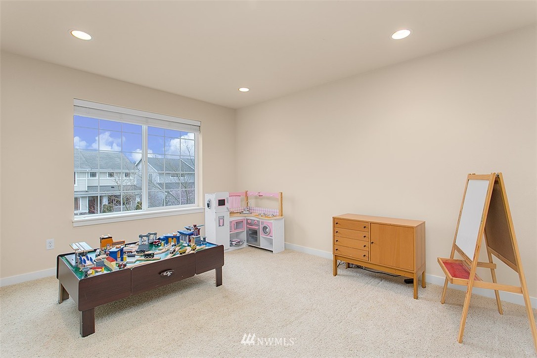 21913 42 Avenue Southeast Bothell, WA 98021 - Photo 21 of 24 a very nice looking room with a large window