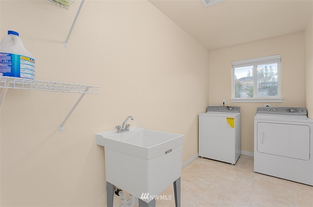 21913 42 Avenue Southeast Bothell, WA 98021 - Photo 22 of 24 a utility room with dryer and washer