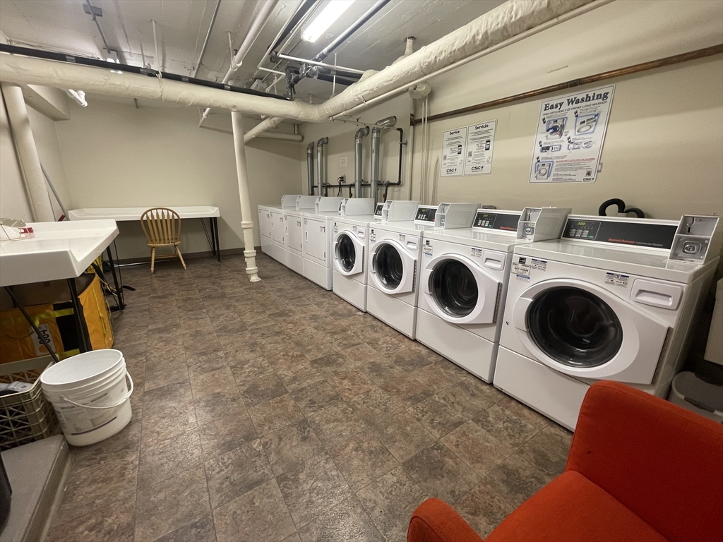 660 Huntington Avenue, Unit 18 Boston, MA 02115 - Photo 13 of 23 a utility room with dryer and washer
