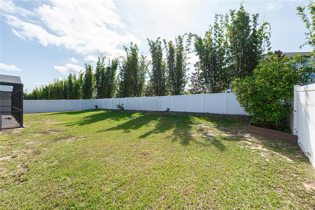 7720 Indian Ridge Trail South Kissimmee, FL 34747 - Photo 33 of 35 a view of an outdoor space and swimming pool