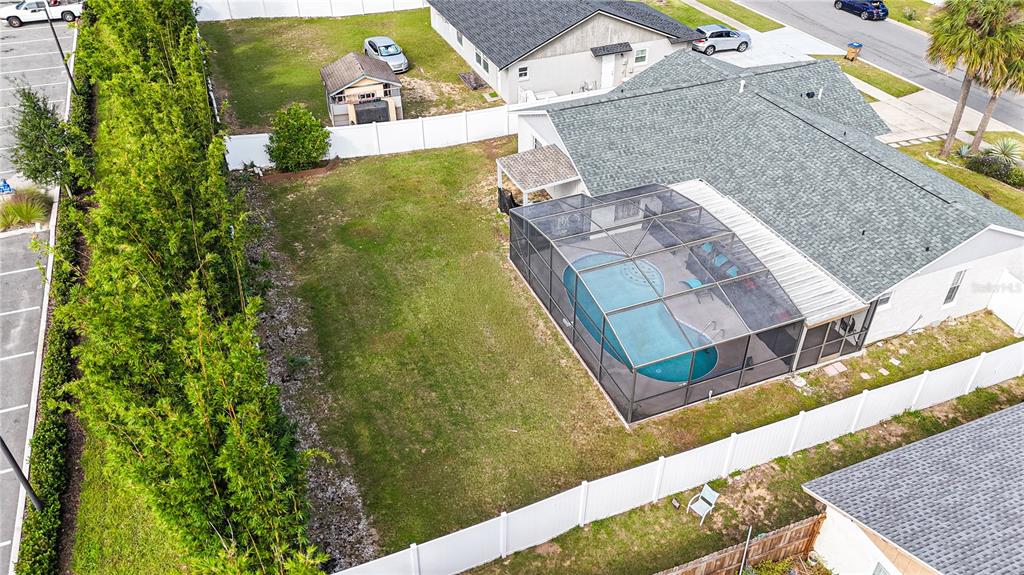 7720 Indian Ridge Trail South Kissimmee, FL 34747 - Photo 34 of 35 view of a house with a yard