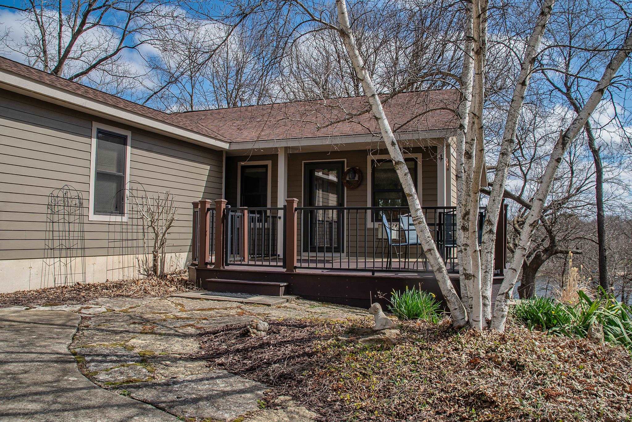 7-a252 Tomahawk Lane Apple River, IL 61001 - Photo 2 of 34 a view of a house with a small garden