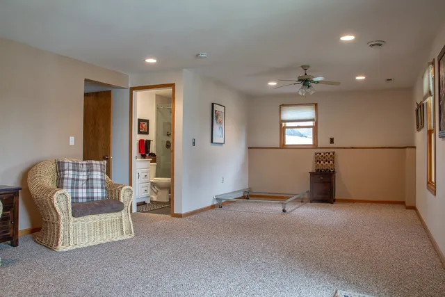 a view of livingroom with furniture and windows
