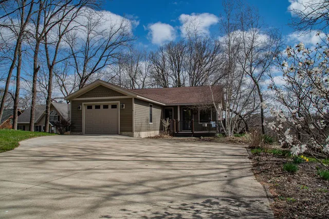 a house with trees in the background