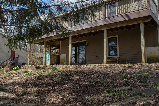 a house with trees in front of it