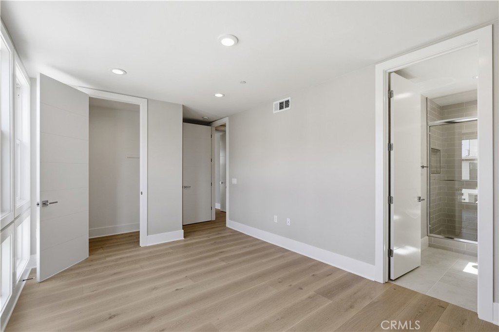 156 Apron Irvine, CA 92618 - Photo 29 of 40 wooden floor in an empty room with wooden floor