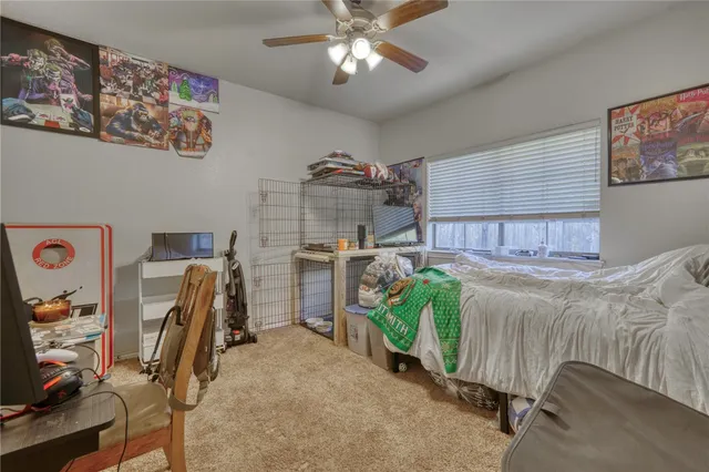 a bedroom with furniture and a bed