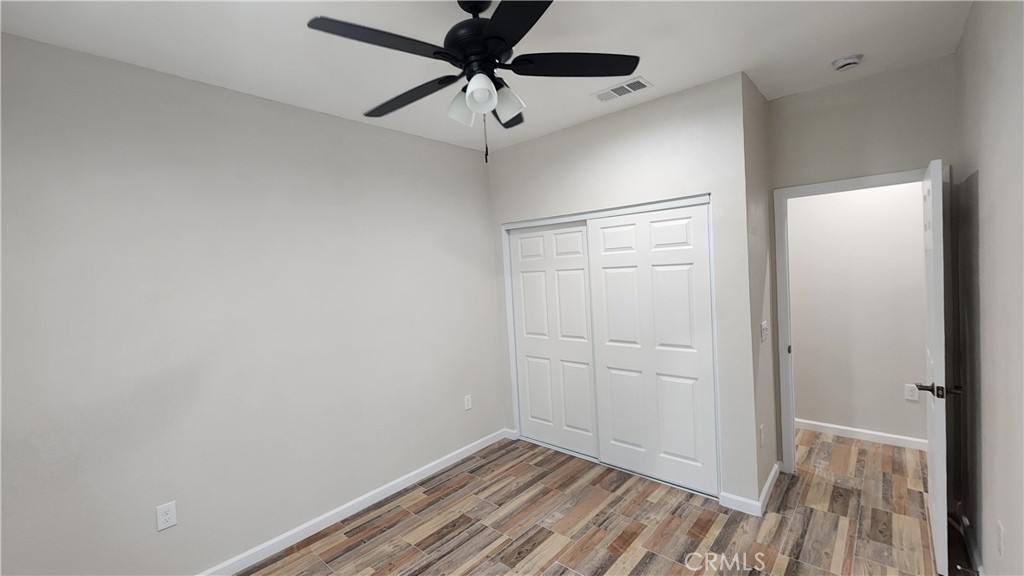 3433 Eucalyptus Avenue Riverside, CA 92507 - Photo 20 of 38 an empty room with a ceiling fan