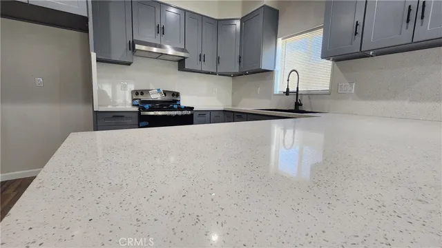 a view of cabinets with wooden floor