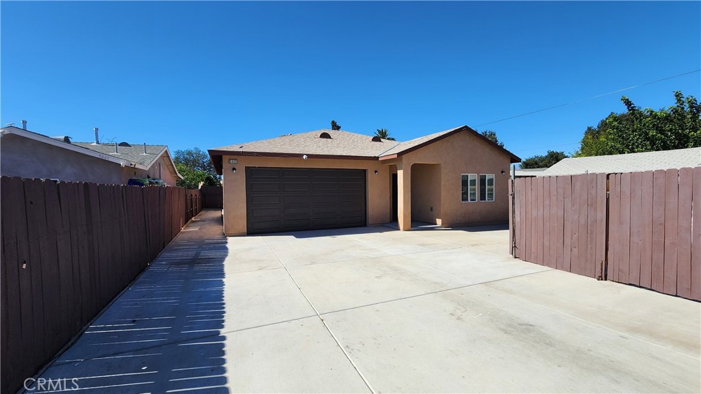 3433 Eucalyptus Avenue Riverside, CA 92507 - Photo 3 of 38 a view of a house with a garage