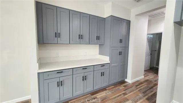 a kitchen with cabinets a sink and dishwasher