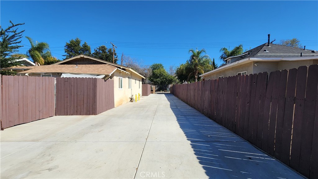 3433 Eucalyptus Avenue Riverside, CA 92507 - Photo 35 of 38 a front view of a house with a yard