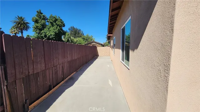 a balcony with wooden floor