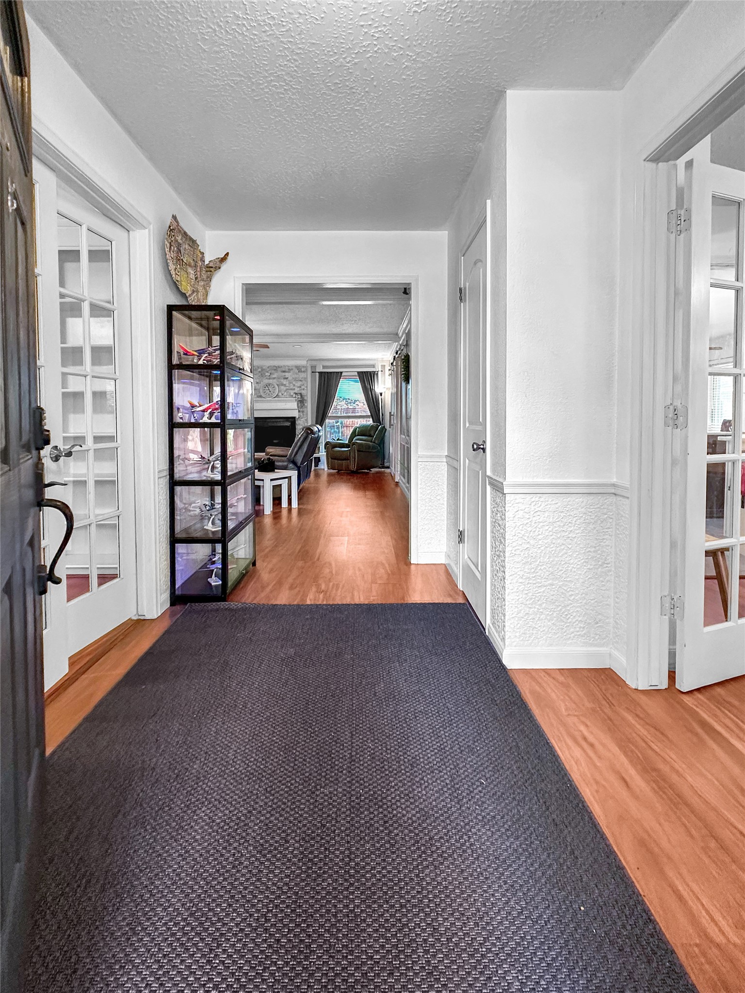 6511 Castle Pine Lane Spring, TX 77379 - Photo 10 of 49 Grand front entryway featuring elegant flooring, welcoming sightlines, and an inviting first impression that sets the tone for the home’s spacious interior.