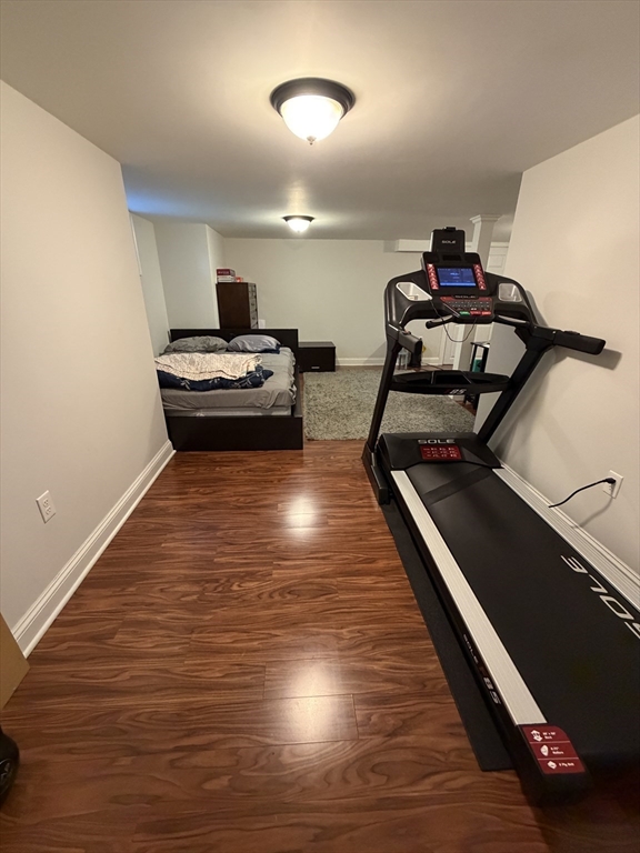 17 Cardinal Street, Unit 17 Winchester, MA 01890 - Photo 35 of 42 a view of a room with gym equipment