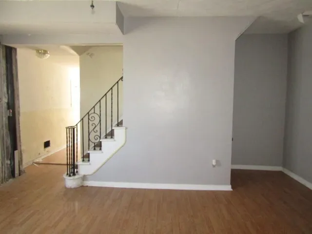 a view of entryway with wooden floor