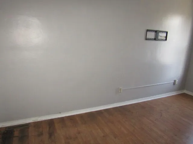 an empty room with a workbench