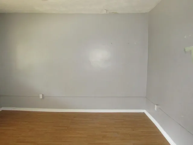 a view of a room with an empty space