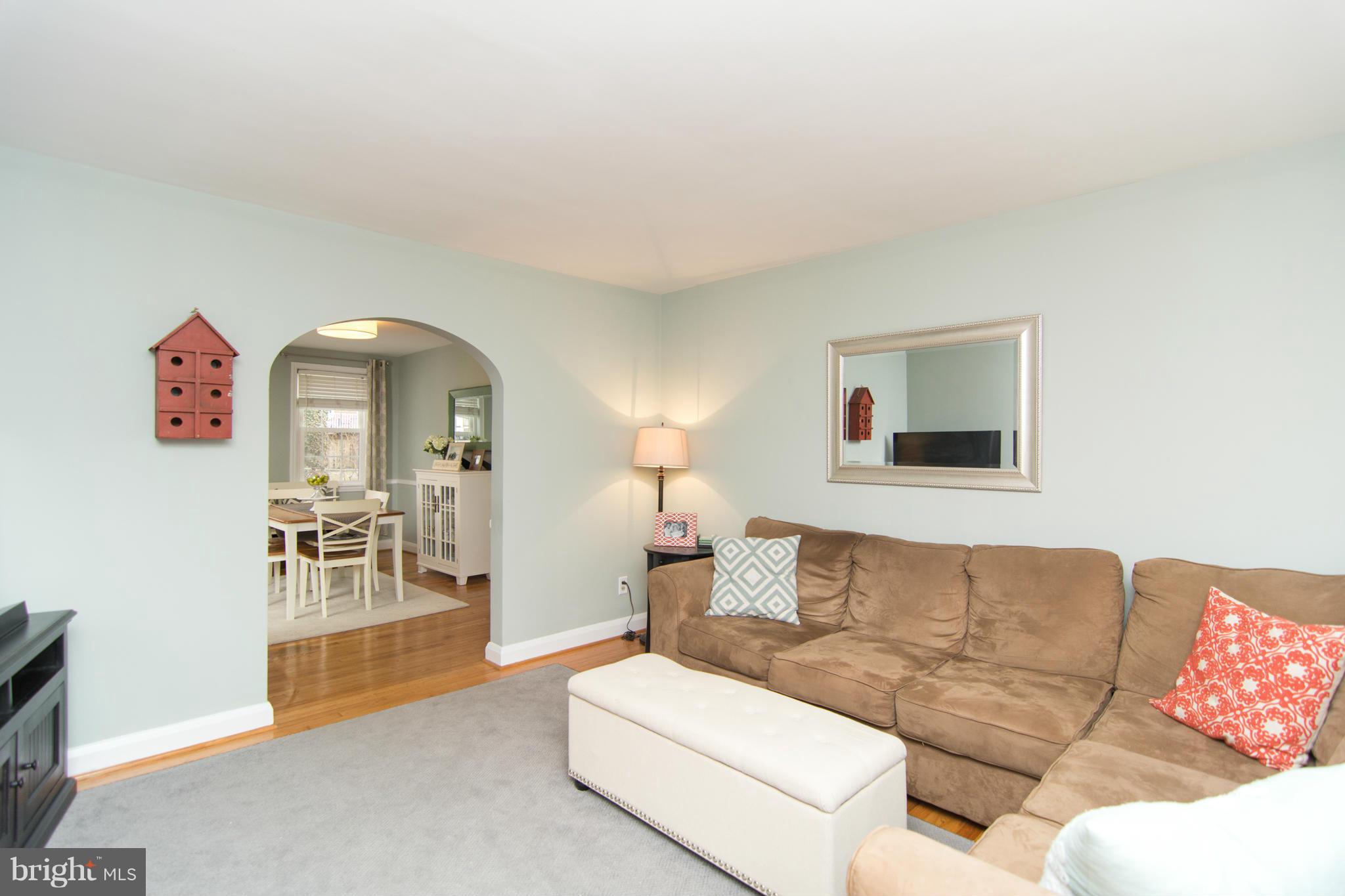 1642 Aberdeen Road Baltimore, MD 21286 - Photo 3 of 25 a living room with furniture and a flat screen tv