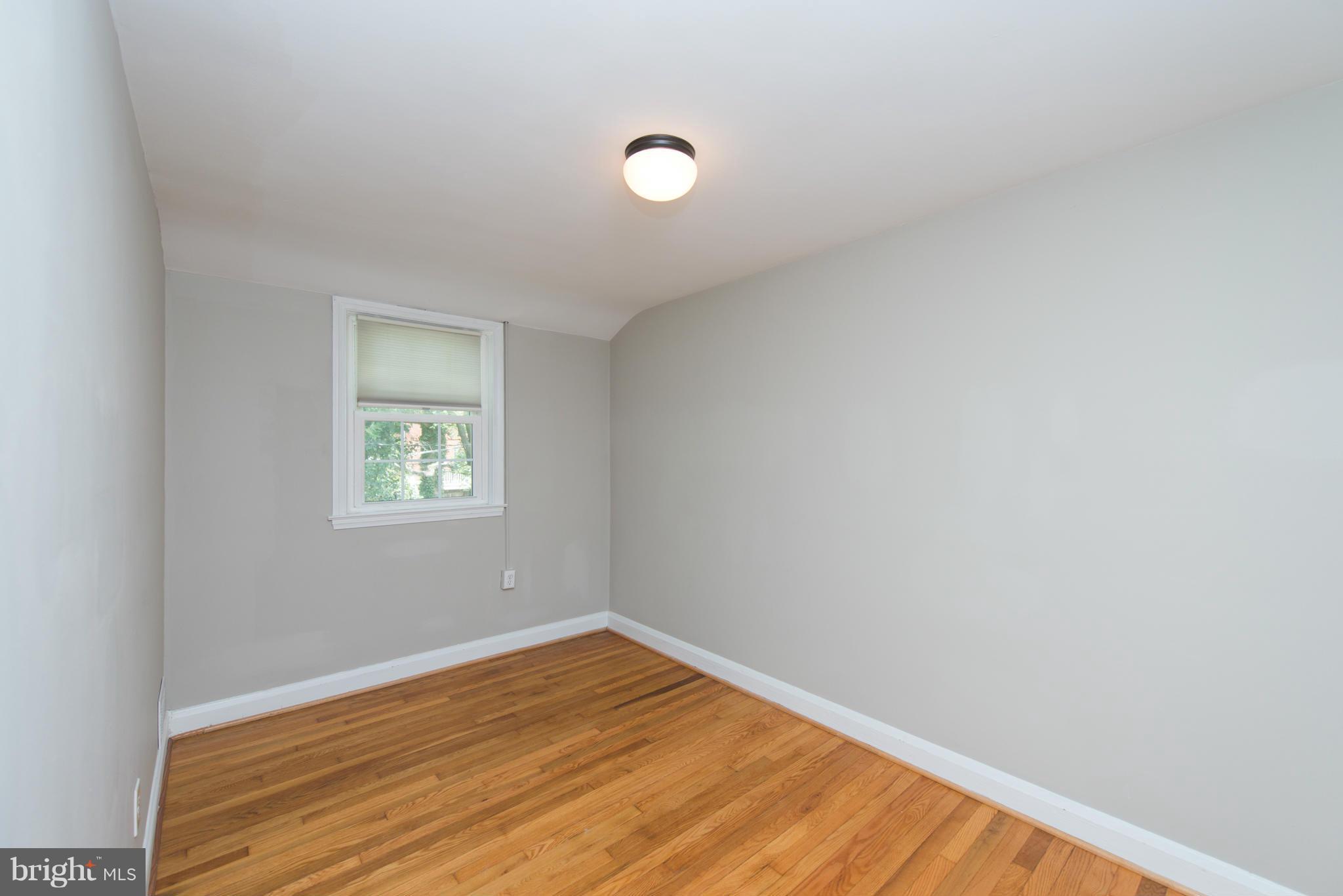 1642 Aberdeen Road Baltimore, MD 21286 - Photo 23 of 25 an empty room with a window