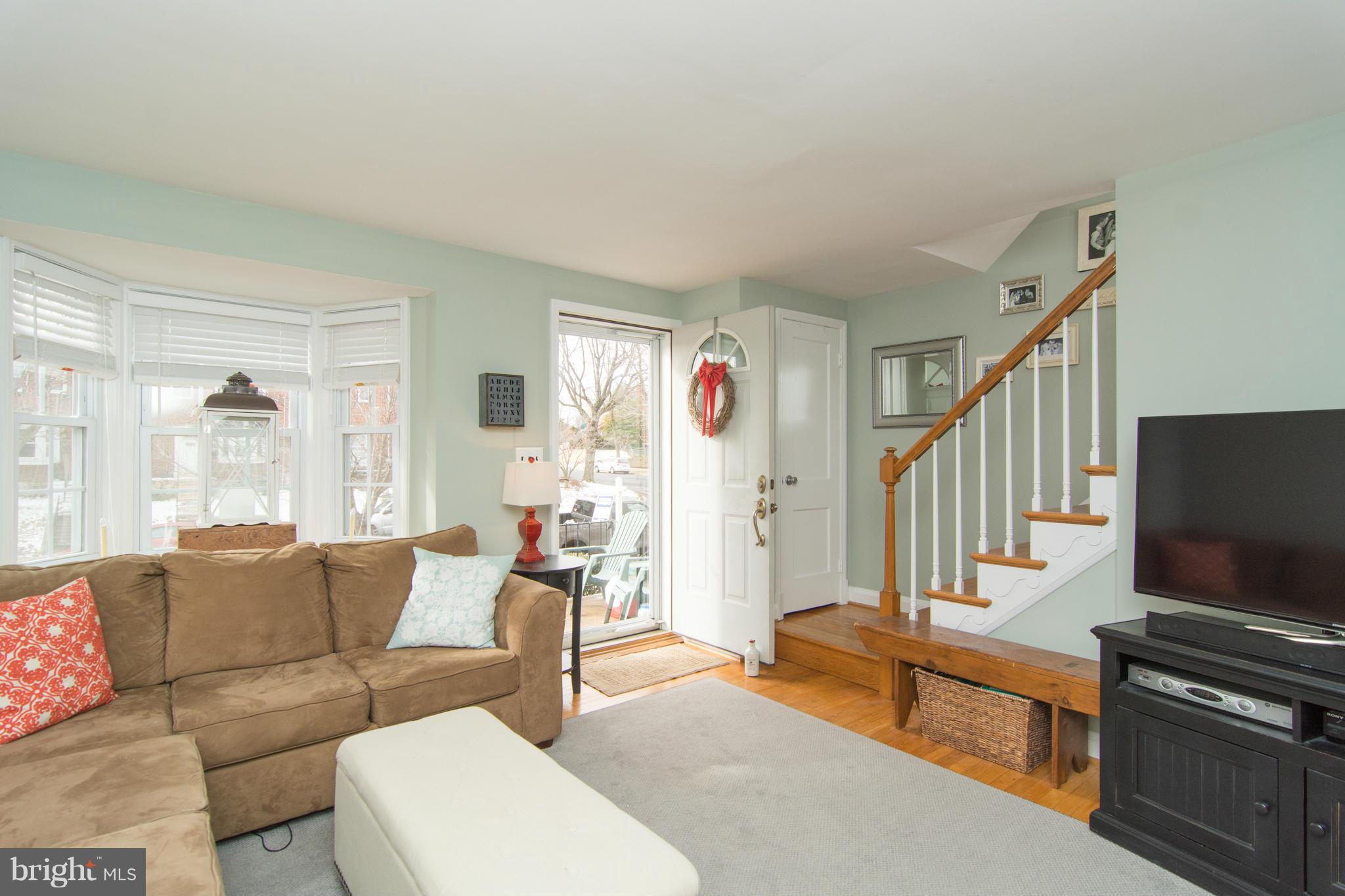 1642 Aberdeen Road Baltimore, MD 21286 - Photo 6 of 25 a living room with furniture and a flat screen tv