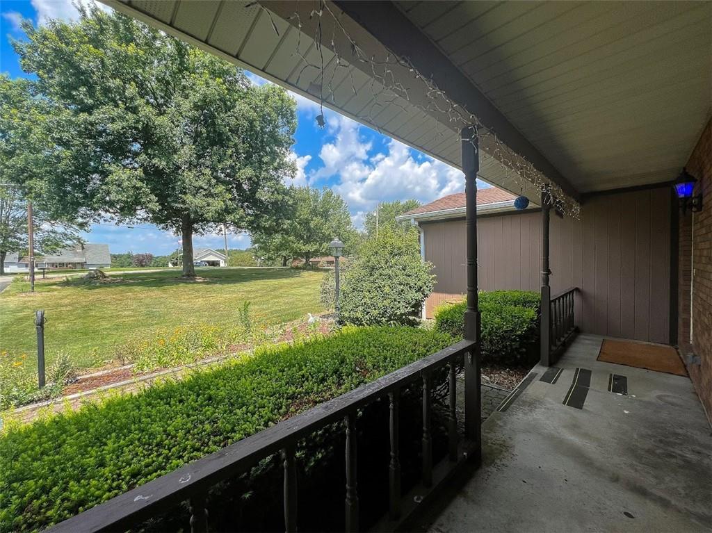 5147 McCandless Road Butler, PA 16001 - Photo 4 of 47 a view of a balcony with chair and table