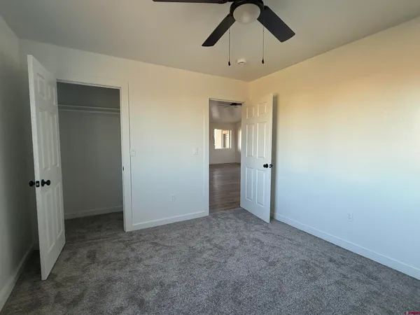 a view of an empty room with a garage