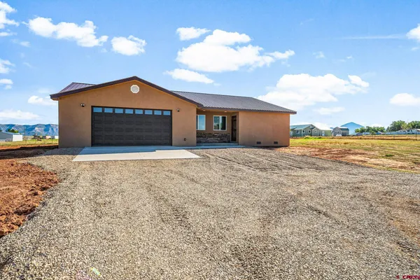 a kitchen with stainless steel appliances granite countertop granite counter tops refrigerator and stove