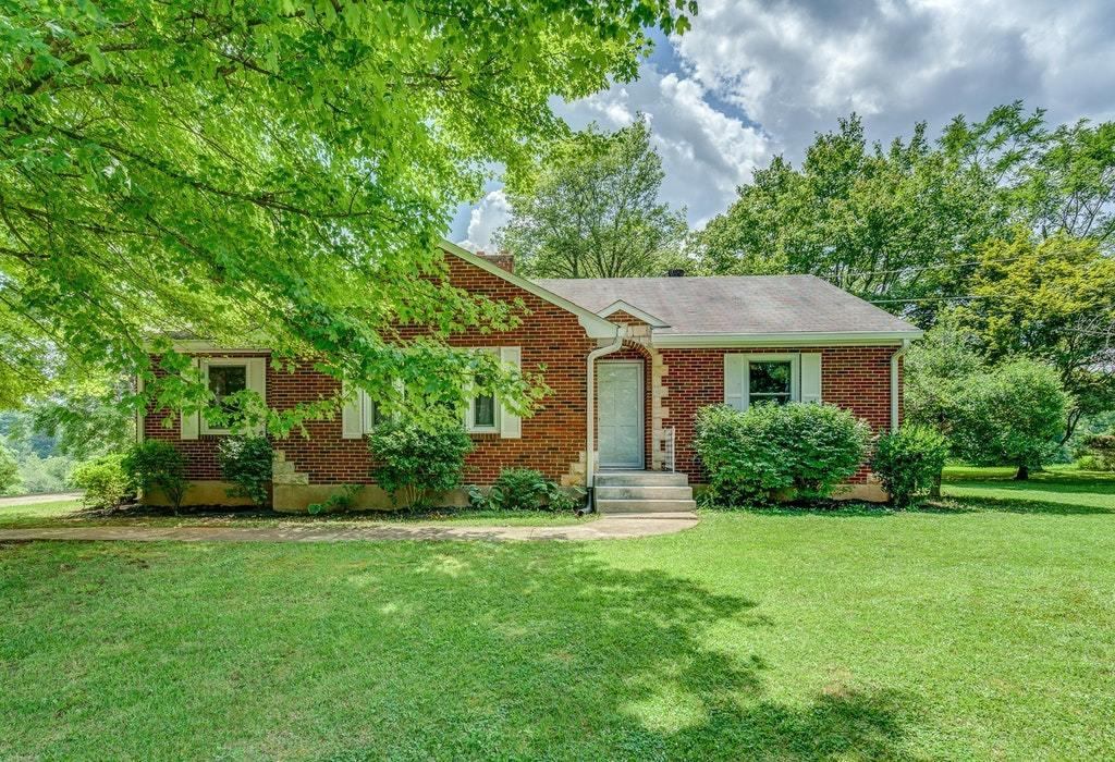 11885 Hardy Road Hardy, VA 24101 - Photo 4 of 48 a view of a house with a yard and garden