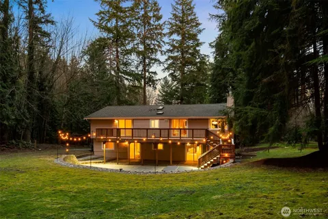 a view of a house with a big yard