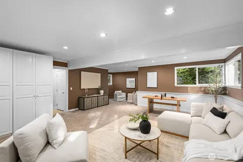 a bathroom with a sink a mirror and a shower