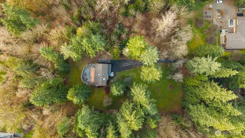 a backyard of a house with lots of green space