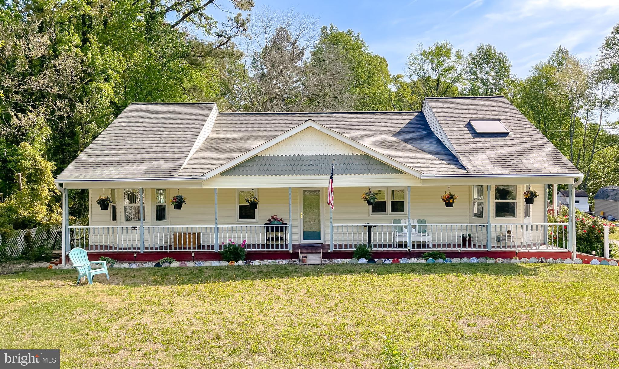 25102 Three Notch Road Hollywood, MD 20636 - Photo 1 of 57 Sprawling front porch; full length of the home