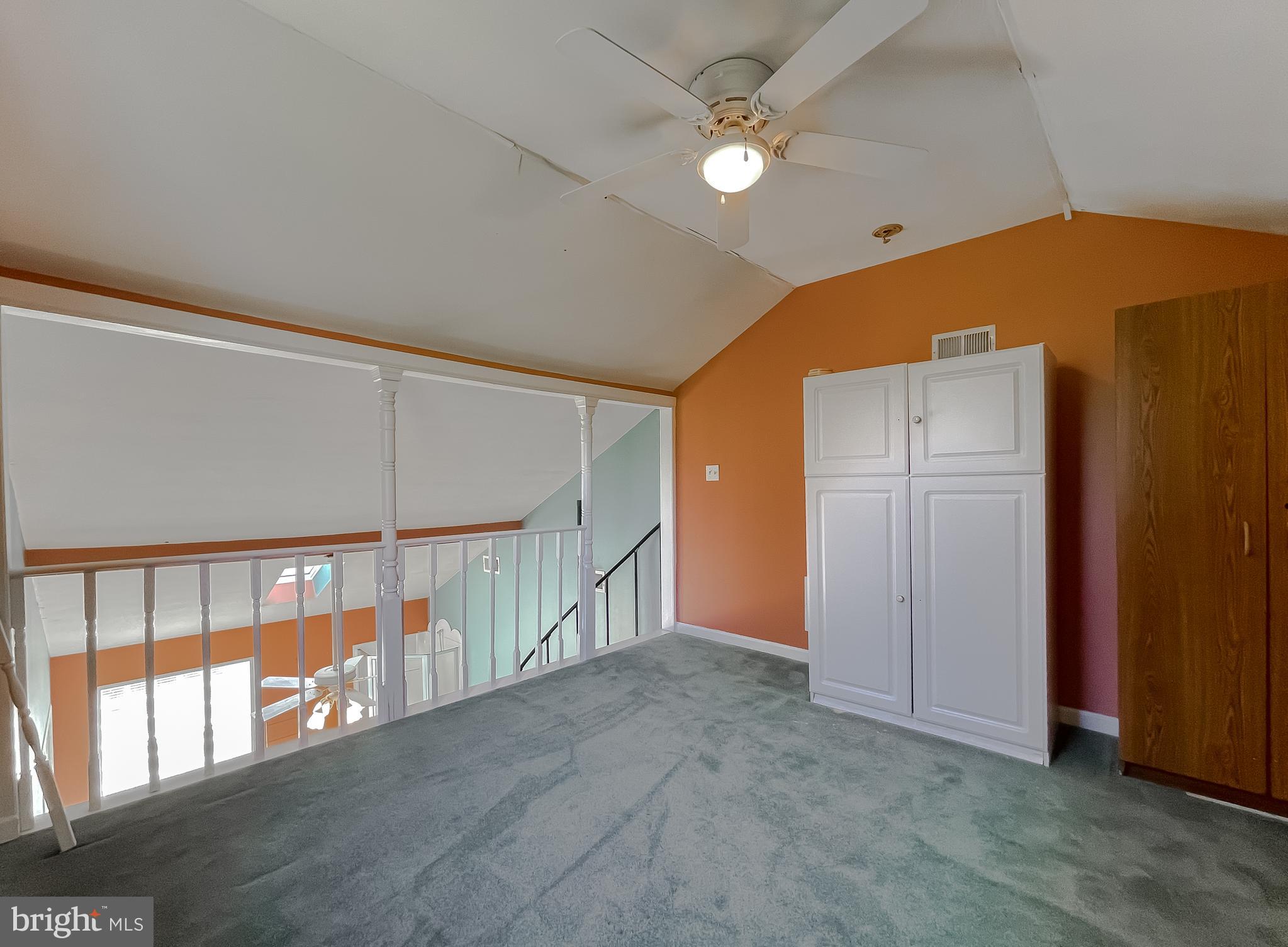25102 Three Notch Road Hollywood, MD 20636 - Photo 33 of 57 View of the upper level loft toward spiral stairs