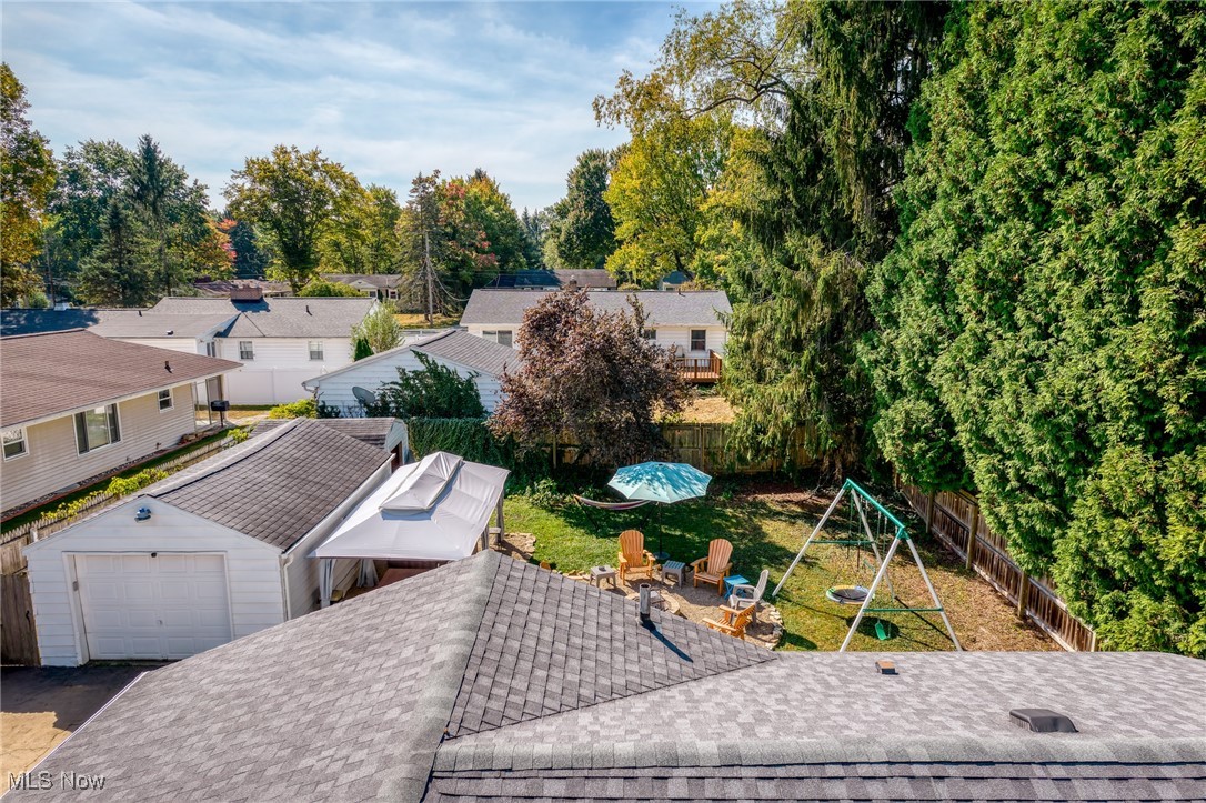 2514 Carson Road Akron, OH 44333 - Photo 4 of 48 Aerial view of residential area featuring a pool area