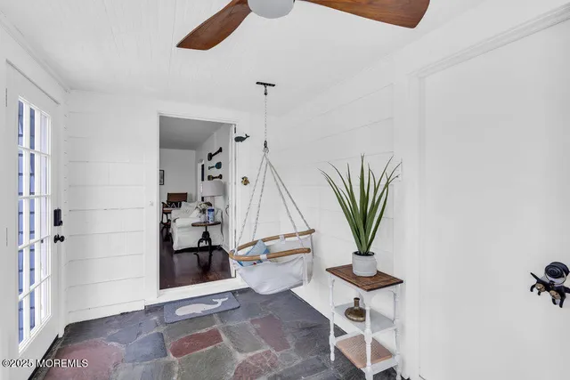 a view of entryway with livingroom and furniture