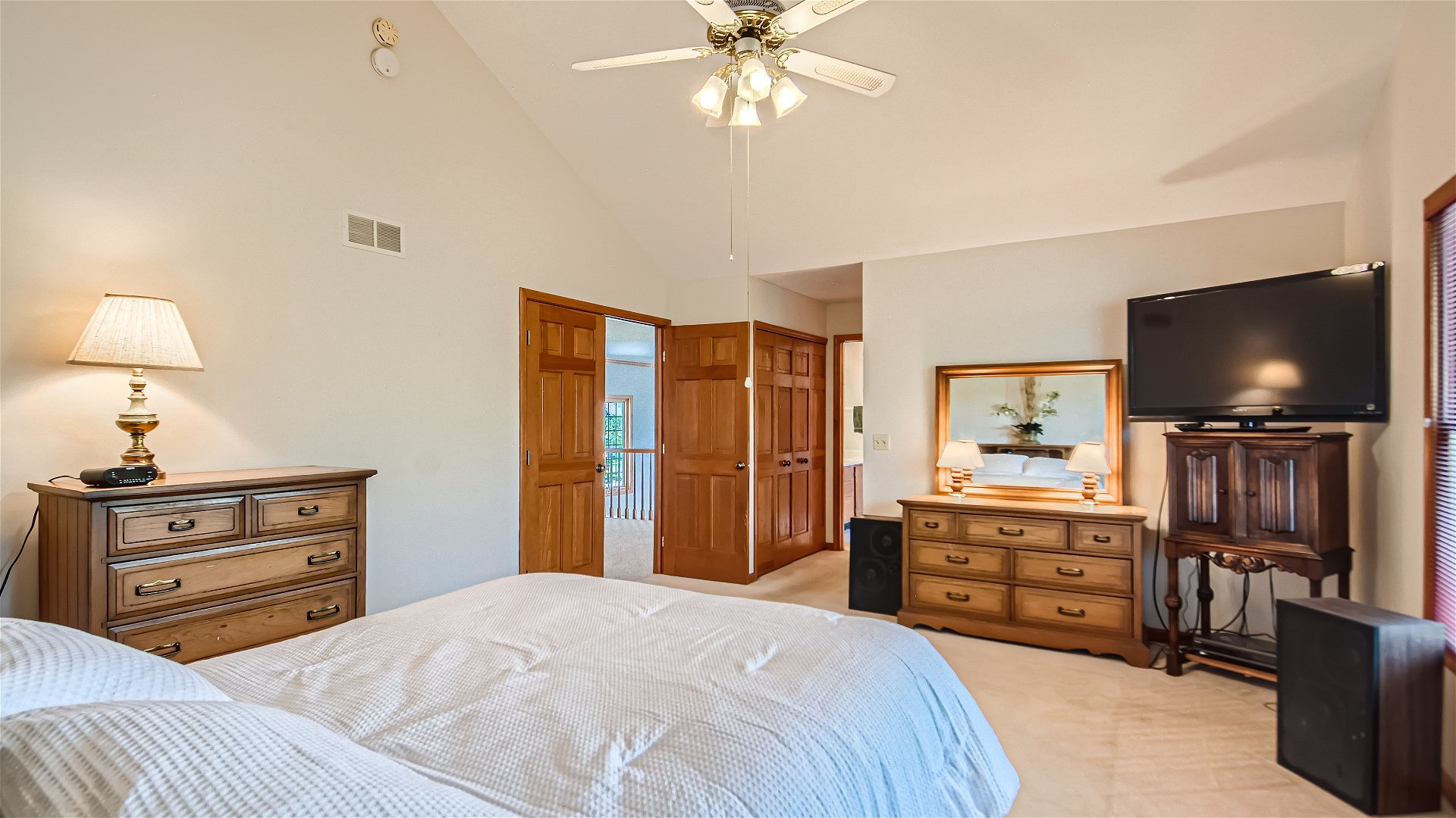 1840 Nicholson Drive Hoffman Estates, IL 60192 - Photo 16 of 28 a bedroom with a bed and a flat screen tv