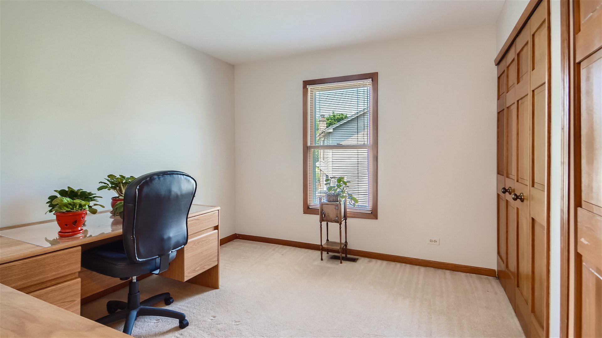 1840 Nicholson Drive Hoffman Estates, IL 60192 - Photo 21 of 28 a view of a workspace with furniture and a window