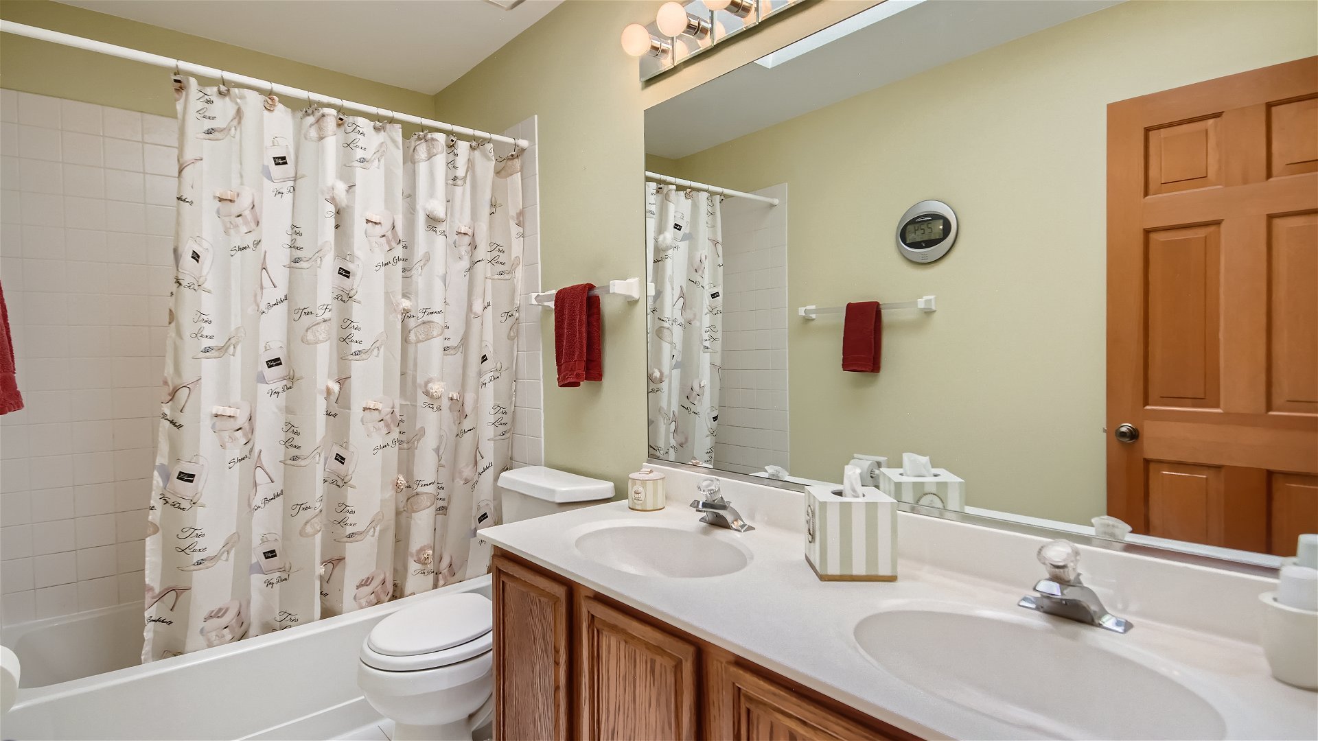 1840 Nicholson Drive Hoffman Estates, IL 60192 - Photo 22 of 28 a bathroom with a sink toilet and shower