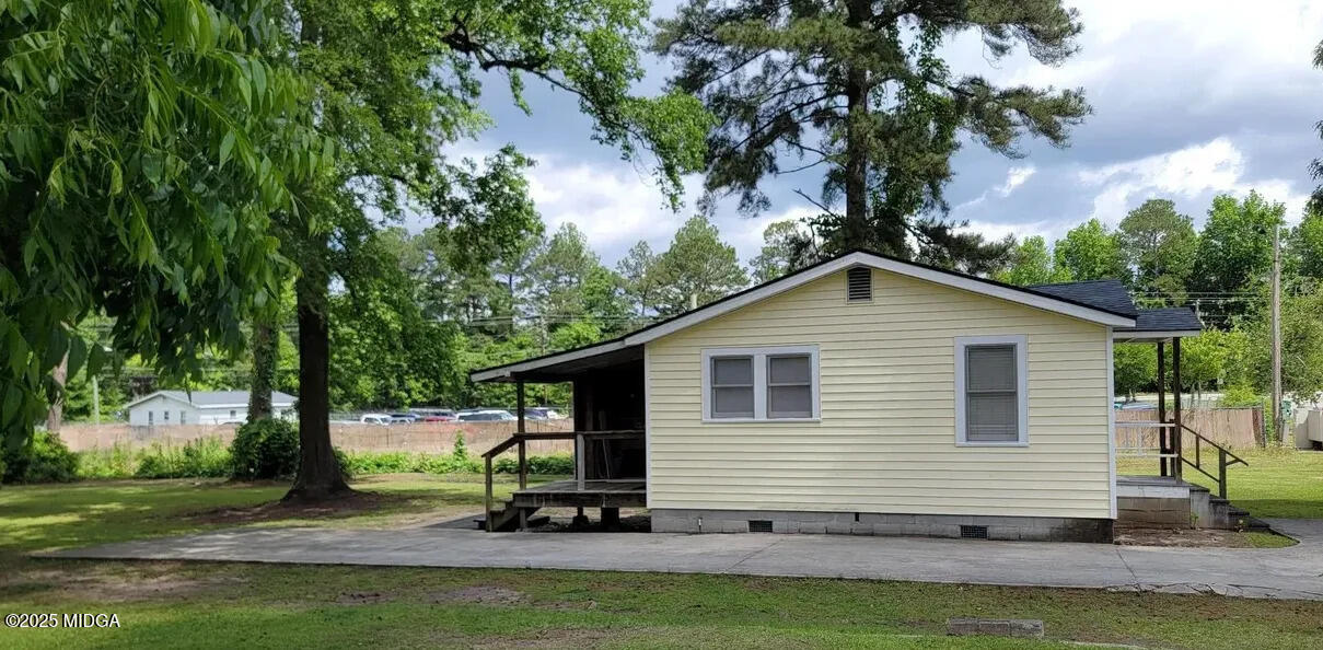 4501 Massey Road Macon, GA 31206 - Photo 3 of 11 a view of a house with a yard