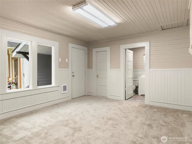 an empty room with windows