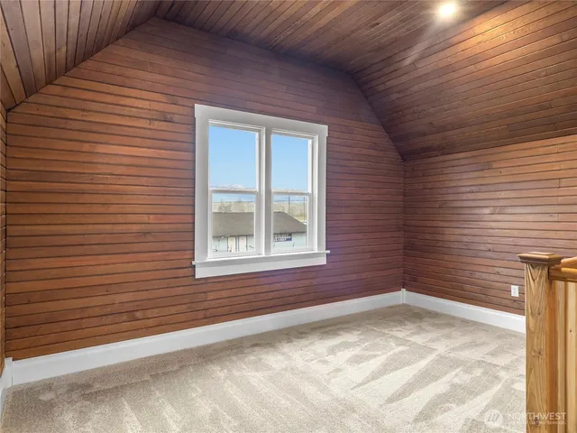 a room with sink and mirror