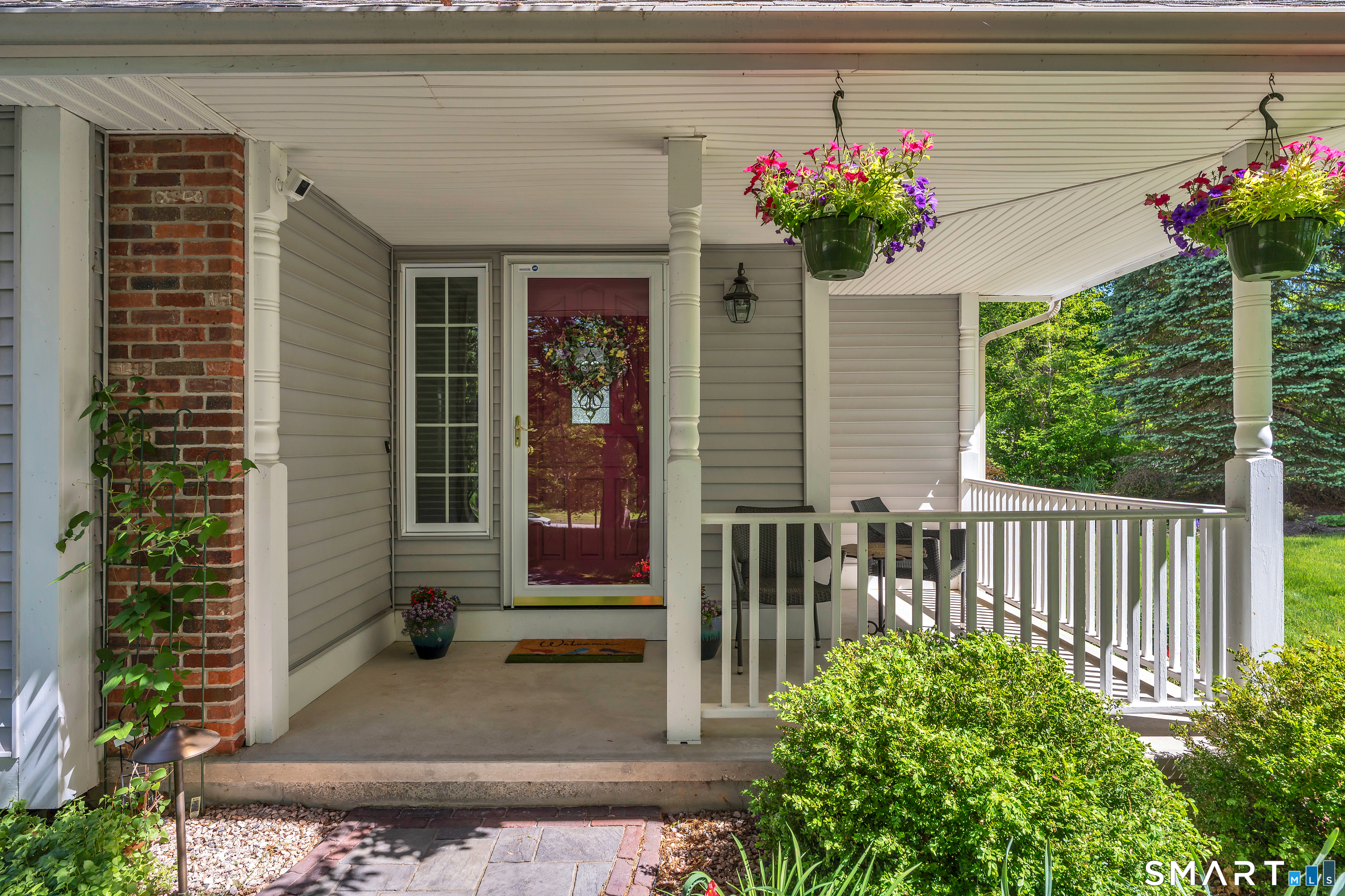21 Stone Wall Road Salem, CT 06420 - Photo 3 of 38 a view of a house with a flower garden
