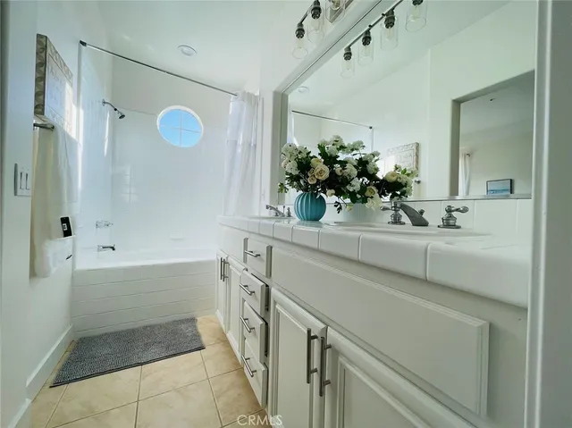 a bathroom with a sink and a bathtub