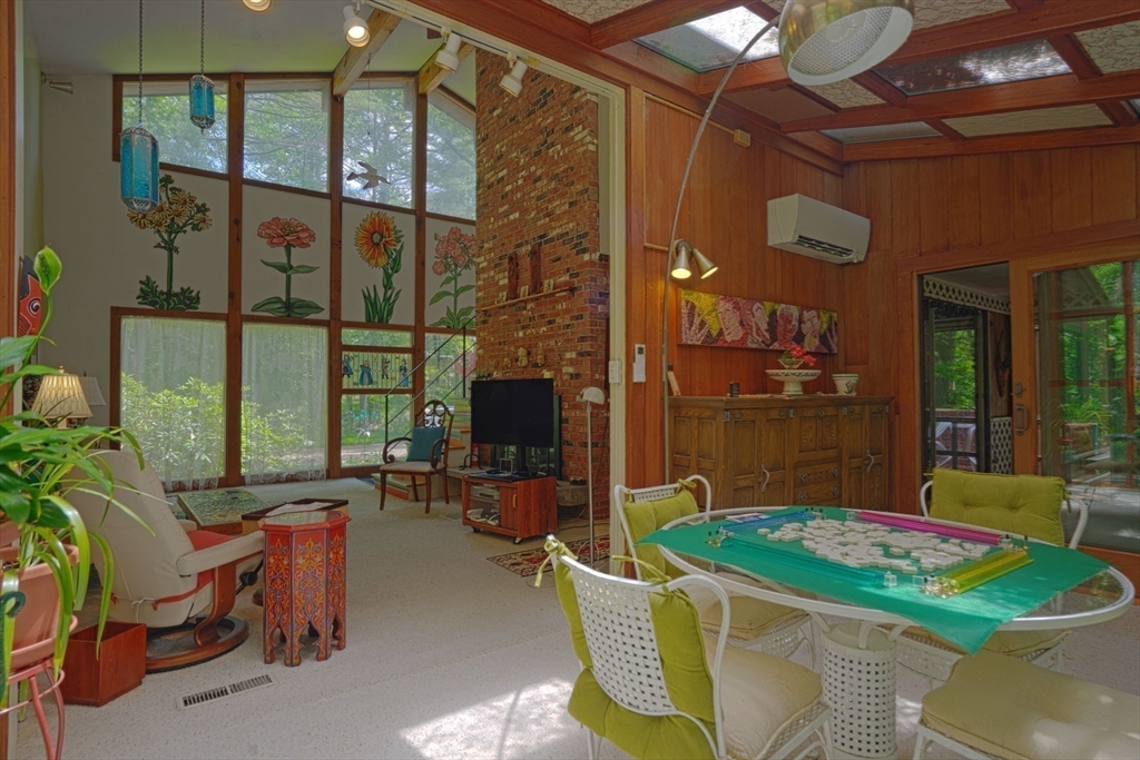 17 Juniper Lane Amherst, MA 01002 - Photo 11 of 42 a view of a chairs and table in a patio